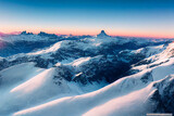Fototapeta Kawa jest smaczna - Snow covered mountain aerial view from drone showing spectacular alpine landscape of winter mountain in Switzerland