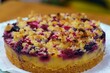 Closeup of a homemade cake with blackberry, blueberry and raspberry