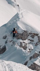 Canvas Print - Person skiing in the snowy mountains