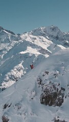 Canvas Print - Person skiing in the snowy mountains