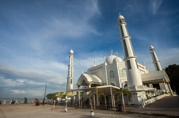 Wall Mural - Al-Hakim Mosque, a mosque on the edge of Padang Beach, in the city of Padang, West Sumatra, Indonesia. A mosque with beautiful architecture and very interesting.