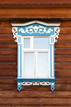 Window In Blue White Decorative Frame In An Old Rural Wooden House