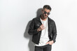 © Viorel Sima - sexy latin man with beard posing with hand in pocket while fixing jacket