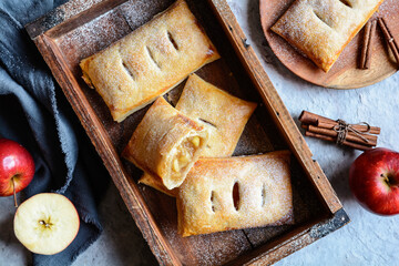 Wall Mural - Puff pastry Turnovers filled with apples and cinnamon