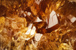 Citrine yellow quartz macro detail texture background. close-up raw rough unpolished semi-precious gemstone
