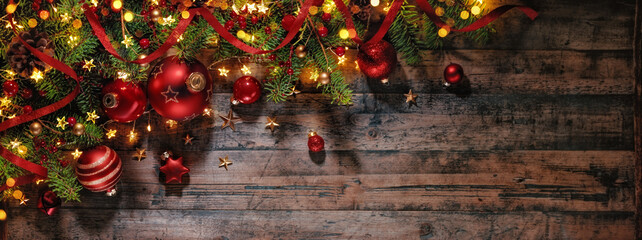 Wall Mural - christmas background with fir twigs, red balls and xmas lights