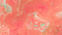 Flowing Elegant Acrylic Pour Background In Beautiful Coral And Pink Colors. Liquid Texture With Gold Glitter.