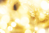 Fototapeta Natura - christmas beautifull shiny gold background. sparkle festive blurred bokeh