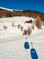 Slope view with funicular and shadow in winter in resort Ladis, Fiss, Serfaus in ski resort in Tyrol.