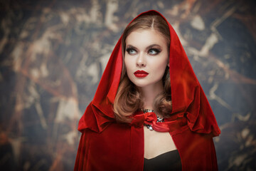 Wall Mural - lovely girl in red cloak