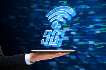 Poster - male hand holding cellphone with 5G glitchy icon hologram on blurry background. 5th Generation Wireless Internet Network connection information technology illustration. 
