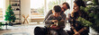 © Jacob Lund - Christmas holiday moments - a boy with his family having a look at his Christmas gift