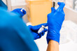 © Westend61 - Hands of nurse preparing syringe at medical clinic