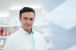 © Westend61 - Confident man in lab coat wearing pharmaceutical industry