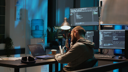 Database admin feeling tired and drained at office job, falling asleep working on html code. Exhausted sleepy man being burnout late at night and yawning, coding security server.