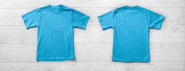 Wall Mural - Front and back views of boy in blue t-shirt on white background. Mockup for design