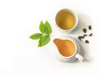 Wall Mural - cup of tea on white background. Oolong tea and green tea.