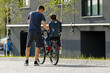 © Ruslan Ivantsov - father riding bike with son in bike seat