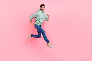 Full length photo of cheerful positive boy trendy comfort clothes go empty space low price black friday isolated on pink color background