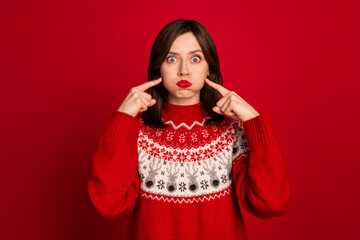 Sticker - Photo of gorgeous nice girl with straight hairstyle wear red sweater holding breath directing at cheeks isolated on red color background