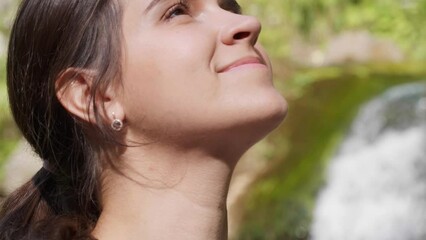 Canvas Print - Meditation in nature. Beautiful young woman in mountains on sunny day, closeup. Camera moving up