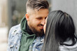 © andriyyavor - Outdoor happy couple in love posing near cafe