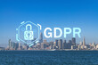 Panoramic city view of San Francisco skyline at sunrise from Treasure Island, California, United States. GDPR hologram, concept of data protection regulation and privacy for all individuals