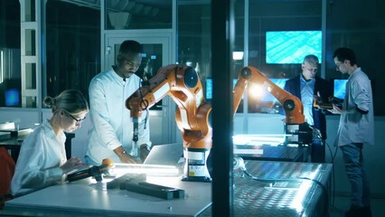 Wall Mural - it laboratory with a group of engineers studying robots