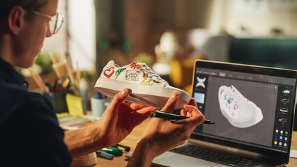Leinwandbilder - Inspired Blonde Man Creating Custom Made Model of Shoes and Looking at 3D Prototype Made in Editing Software on his Laptop. Arts and Unique DIY Objects For Personal Style Concept.