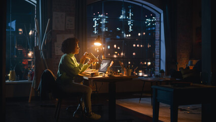 Leinwandbilder - Black Woman Sitting at Her Desk, Drawing, Working on Custom Made Sneakers. Female Professional Artist Creating New Design For e-business Drop Sale. Unique Hand Made Footwear Concept.