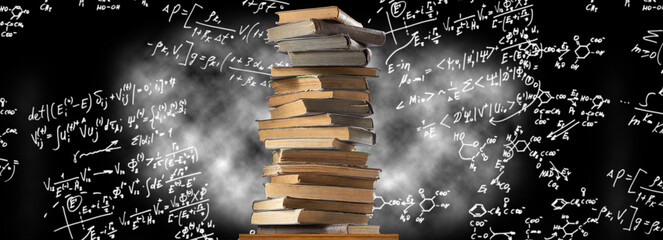 books on the background of an abstract image of various mathematical and chemical formulas