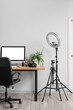 © Pixel-Shot - Interior of modern office with photographer's workplace and equipment