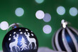 christmas balls on green background