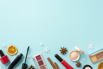 Wall Mural - Christmas season concept. Top view photo of decorative cosmetics lip gloss nail polish mascara eyeshadow palettes dried orange slices anise snowflakes on isolated pastel blue background with copyspace