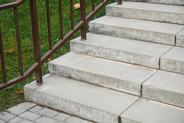 Wall Mural - view of steps with railing in autumn park, closeup