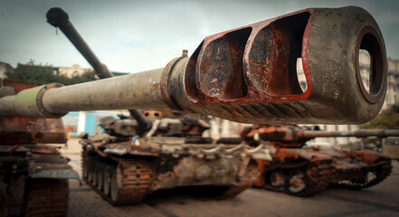 Closeup of the barrel of a tank, military equipment and armored vehicles.