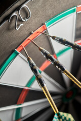 Wall Mural - Three darts in the doubling 20 sector. Playing darts 120 scored with three darts