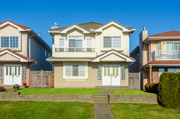 Wall Mural - Houses in suburb at Spring in the north America. Luxury houses with nice landscape.