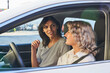 © Yuya Parker - two people in a car talking and one is gesturing