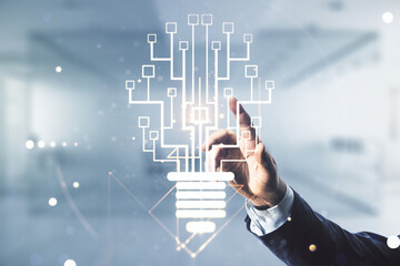 Aufkleber - Male hand working with virtual creative light bulb with chip hologram on blurred office background, artificial Intelligence and neural networks concept. Multiexposure
