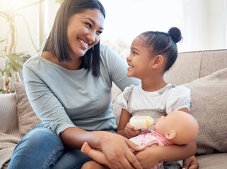 Home, mother and child with doll playing on sofa having fun, bonding and enjoying weekend. Family, love and mom sitting with young girl with toys on couch for quality time, holiday and happy together