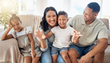 Fototapeta  - Love, black family and being happy, silly and have fun together on couch in living room. Parents, mother and father with children, happiness and bonding on sofa in lounge for quality time or playful