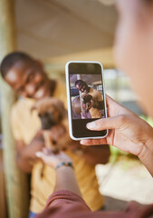 Sticker - Phone picture, dog and woman hand showing man and new pet outdoor with happiness. Black man, puppy and black woman together with couple bonding hug using mobile technology and camera with a smile