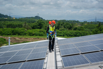 Aufkleber - Solar power,Engineer inspect solar panels on the roof of a factory where solar panels are installed using solar energy.