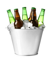 Canvas Print - Metal bucket with different bottles of beer and ice cubes on white background