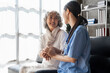 © itchaznong - Home healthcare nurse, physical therapy with senior adult woman at home