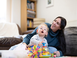 Mother and son playing at home