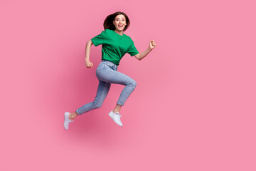 Wall Mural - full size profile photo of cheerful energetic girl jump rush empty space isolated on pink color back