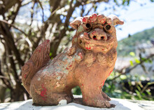 Shisa (Lion Statue) On Wall In Okinawa