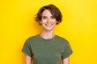 Photo of nice gorgeous adorable pretty woman with bob hairstyle wear khaki t-shirt dental advert isolated on yellow color background